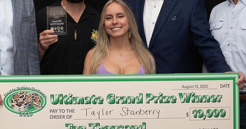 Woman snags ,000 and 60 invasive snakes in record-breaking Florida Python Challenge