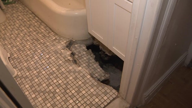 Hole in bathroom floor 