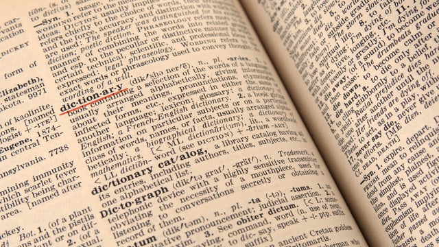 Dictionary page close up with underlined word 