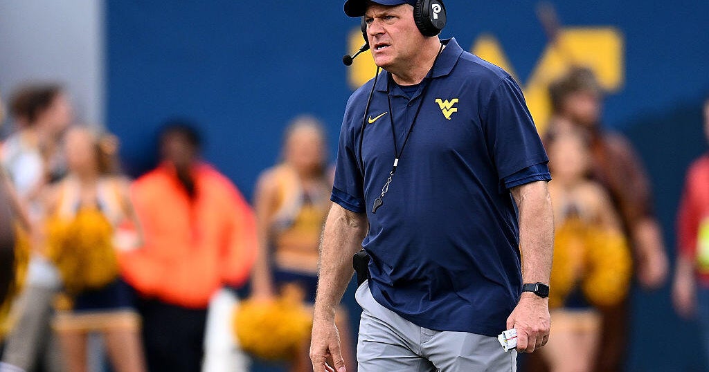 A new generation learns Rich Rodriguez's demanding coaching style at West Virginia 