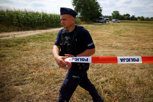 An unidentified body fell and exploded in the corn field overnight 