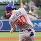 Tucker hits 2 homers and drives in 5 as Cubs blow out Angels 12-1 