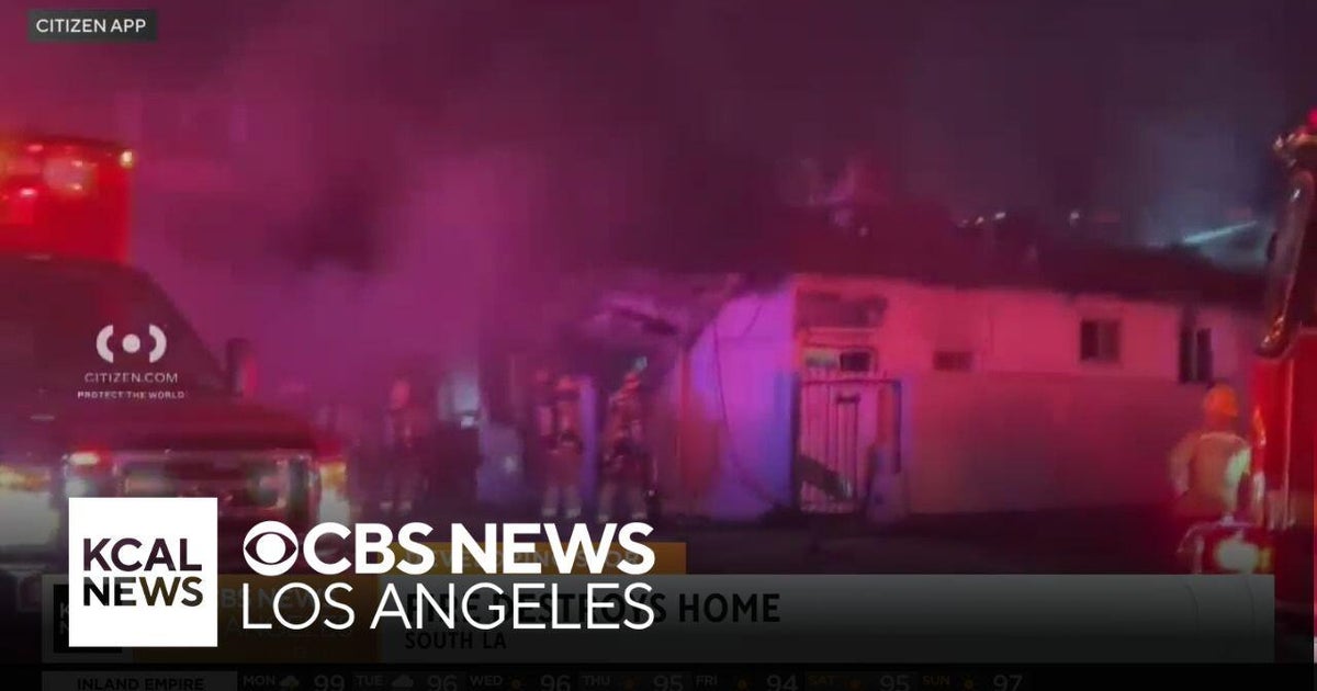 Firefighters battle South Los Angeles house fire - CBS Los Angeles