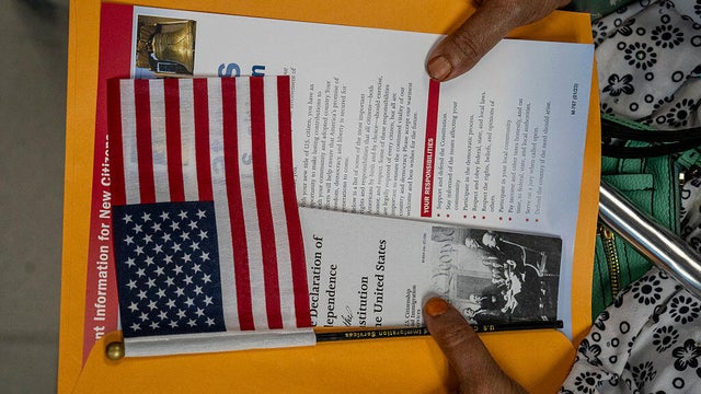 Candidates for U.S. citizenship sit before receiving their certificates of naturalization during a formal ceremony on June 4, 2025, in New York. 