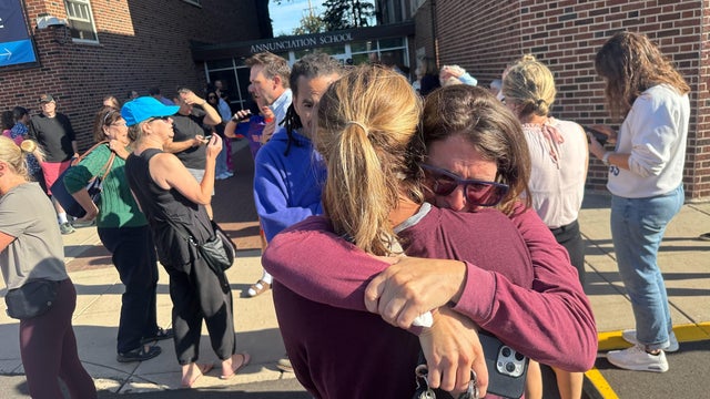 Parents await news of their children's status after shooting at Annunciation Church on Wednesday morning, Aug. 27, 2025 in Minneapolis 