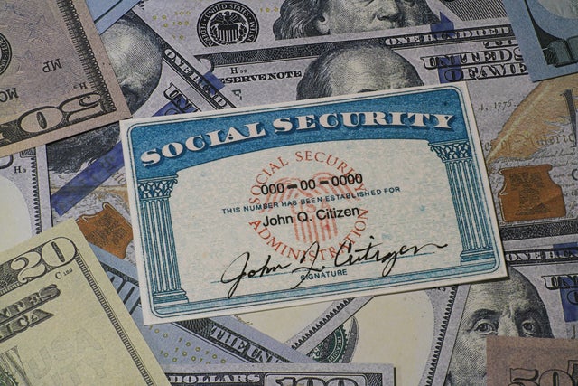 Lake Elsinore, CA, USA - January 30, 2022: Fake Social security card on prop fake US currency 