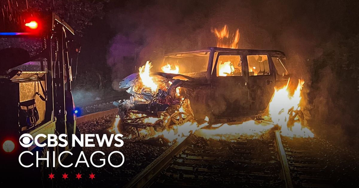 Person seriously injured after freight train hits vehicle in Harvard ...