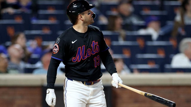Luis Torrens #13 of the New York Mets watches his eighth inning three run home run against the Miami Marlins at Citi Field on August 29, 2025 in New York City. 