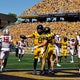 West Virginia beats Robert Morris 45-3 in Rich Rodriguez's coaching return 