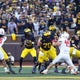 No. 14 Michigan tops New Mexico 34-17 