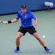 CEO apologizes for taking tennis star's hat from boy at U.S. Open 