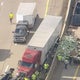 Eastbound I-94 in Ann Arbor reopens after semi-truck spills bottles 