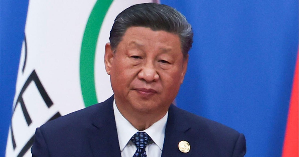 What does Xi Jinping hope to accomplish with military parade?