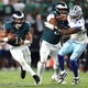 NFL season opens with Eagles edging Cowboys in game with lightning-linked delay 
