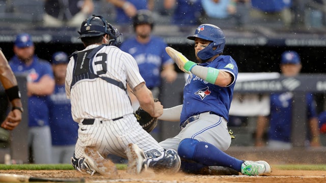 Bo Bichette #11 of the Toronto Blue Jays is tagged out at the plate by Austin Wells #28 of the New York Yankees ending the sixth inning at Yankee Stadium on September 06, 2025 in New York City. 