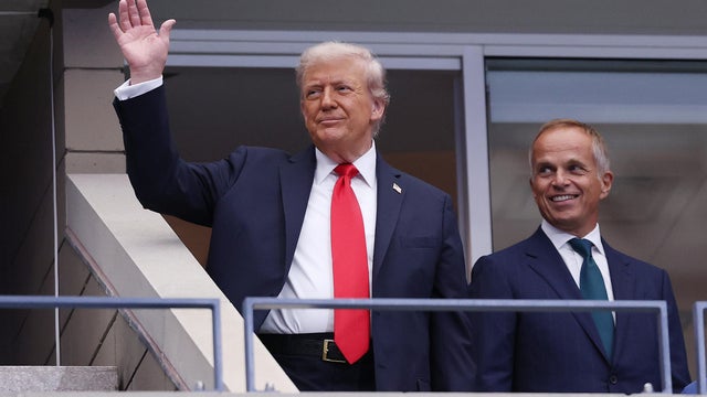 President Trump and Rolex CEO Jean-Frederic Dufour arrive in the Rolex suite prior to the Men's Singles Final match between Jannik Sinner of Italy and Carlos Alcaraz of Spain on Sept. 7, 2025 in New York City. 