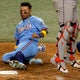 Rangers rally to beat Astros 4-2, stay in AL wild-card race 