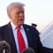Trump walks back Chicago threats, says "we're not going to war"