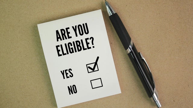 Pen and paper with question word Are you eligible? the concept of choice. choose yes 