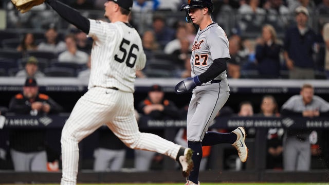 Detroit Tigers' Trey Sweeney (27) runs to home plate to score on a wild pitch by New York Yankees pitcher Mark Leiter Jr. (56) during the seventh inning of a baseball game Tuesday, Sept. 9, 2025, in New York. 