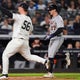Tigers score 9 runs in 7th inning to trounce wild Yankees 12-2 