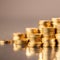 Gold prices are near a record high. Here's why experts say it's worth investing in anyway.