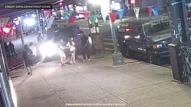 Surveillance video shows an SUV moments before striking four people on a sidewalk 