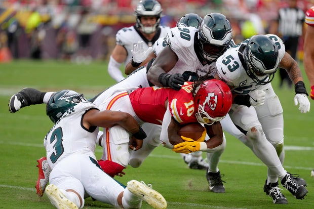 Kansas City Chiefs running back Isiah Pacheco is tackled by Philadelphia Eagles' Nolan Smith, Jordan Davis and Zack Baun