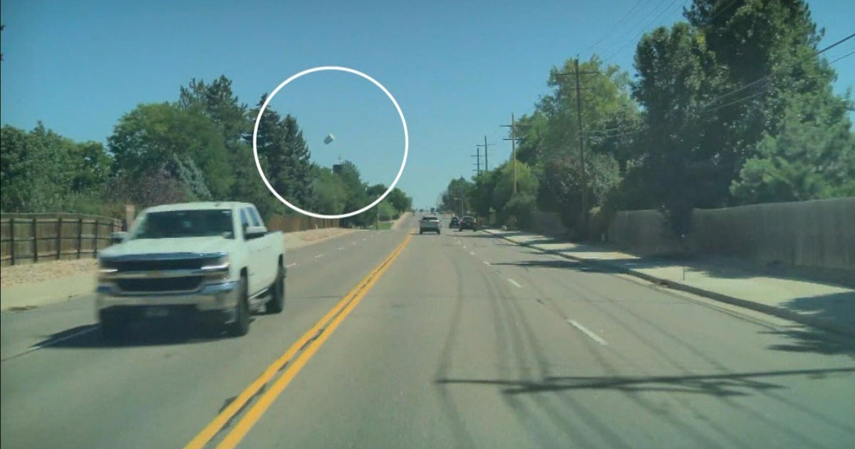 Video shows pickup truck passenger in Colorado throwing object at ...