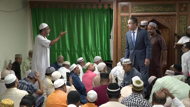 A man at a Queens mosque shouts at former Gov. Andrew Cuomo during a campaign event 