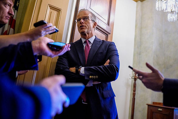 Senate Majority Leader John Thune of South Dakota speaks to reporters outside his office at the U.S. Capitol in Washington, D.C., on Sept. 18, 2025. 