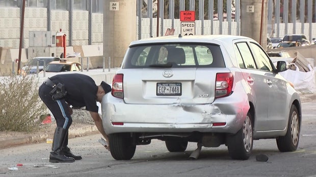 A Scion with rear-end damage 