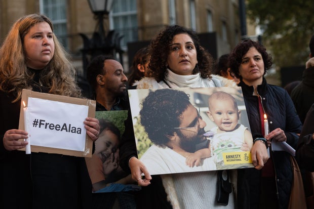 Mona Seif, sister of the jailed British-Egyptian human rights activist Alaa Abdel-Fattah, is joined by supporters during a vigil outside Downing Street to demonstrate concern for her brother in London on Nov. 6, 2022. 