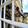 14 killed in prison clashes in Ecuador as some inmates escape 