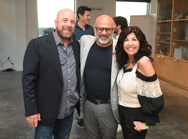 People pose for photos at Mud Ball 2025