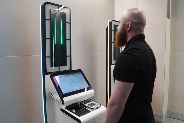 A person gets their picture taken at an Entry/Exit System kiosk during a preview of the system at St. Pancras Station in London, Sept. 3, 2025. 