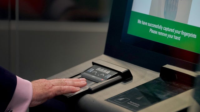 An identity and fingerprint terminal is used during a preview of the newly developed Entry/Exit System zone at the Eurotunnel terminal in Folkestone, England, Sept. 23, 2025. 