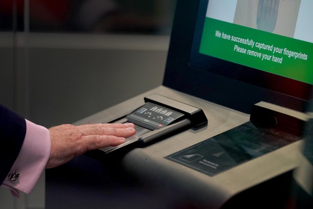An identity and fingerprint terminal is used during a preview of the newly developed Entry/Exit System zone at the Eurotunnel terminal in Folkestone, England, Sept. 23, 2025. 