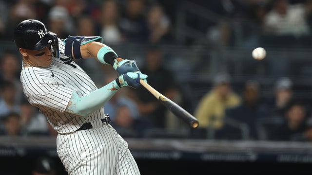 Aaron Judge #99 of the New York Yankees hits a 3-run home run during the second inning against the Chicago White Sox at Yankee Stadium on September 24, 2025 in the Bronx borough of New York City. 