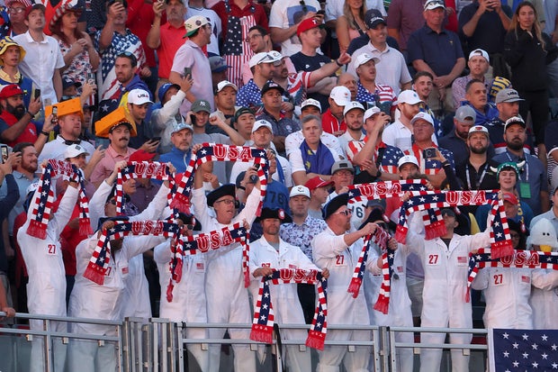 Fans of Team United States cheer on the first tee during the Friday morning foursomes matches of the 2025 Ryder Cup at Black Course at Bethpage State Park Golf Course on September 26, 2025 in Farmingdale, New York.