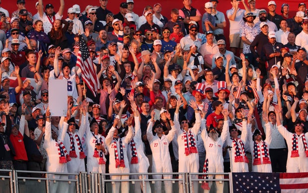 Fans of Team United States cheer while in the first hole tee grandstands during the Saturday morning foursomes matches of the 2025 Ryder Cup at Black Course at Bethpage State Park Golf Course on September 27, 2025 in Farmingdale, New York. 