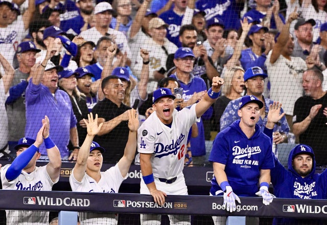Los Angeles Dodgers defeated the Cincinnati Reds 8-4 to win game 2 of a wild card series baseball game and advance to the NLDS.