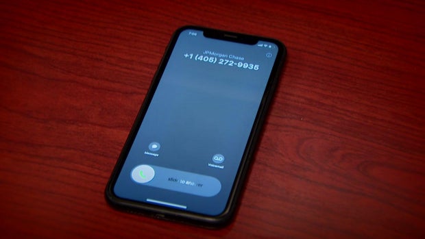 Phone ringing with caller ID "JPMorgan Chase" 