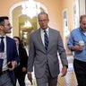 Senate Majority Leader John Thune of South Dakota speaks with reporters as he walks onto the Senate floor at the U.S. Capitol in Washington, D.C., on Oct. 8, 2025, during the ongoing government shutdown. 