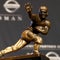Reporter's Notebook: The story behind the Heisman Trophy