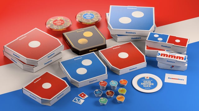 A sampling of Domino's new packaging, which will feature brighter colors and a different font. 