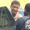 Escaped inmate blew a kiss and smiled as he was detained after fleeing prison