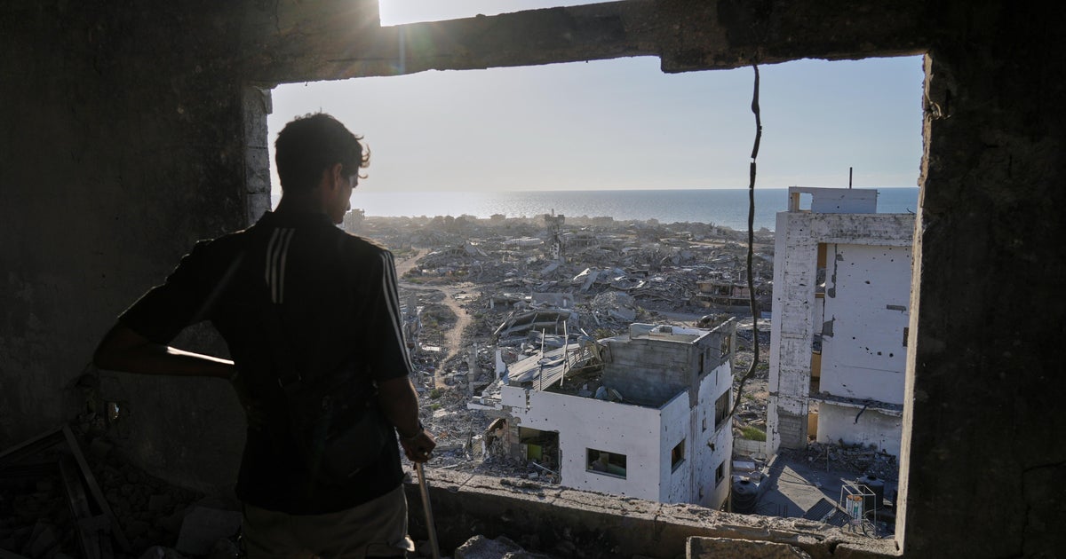 Israel awaits the release of hostages, as Palestinians return to the ruins of their homes
