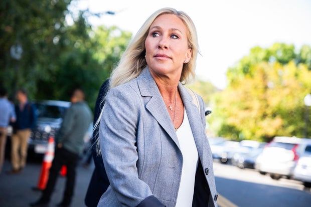 Rep. Marjorie Taylor Greene talks with reporters after a meeting of the House Republican Conference at the Capitol Hill Club on Tuesday, September 9, 2025.