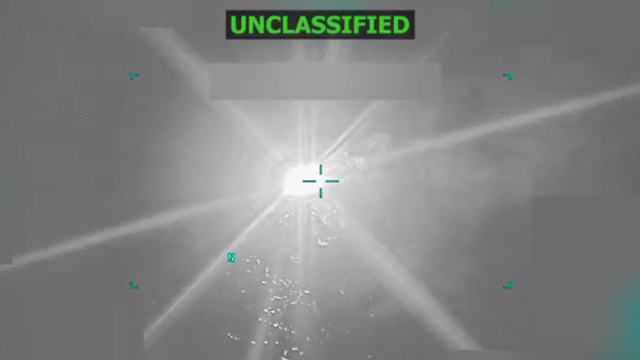 A screenshot of a video posted by President Trump showing the destruction of an alleged drug-carrying boat of the coast of Venezuela on Tuesday, Oct. 14, 2025. 